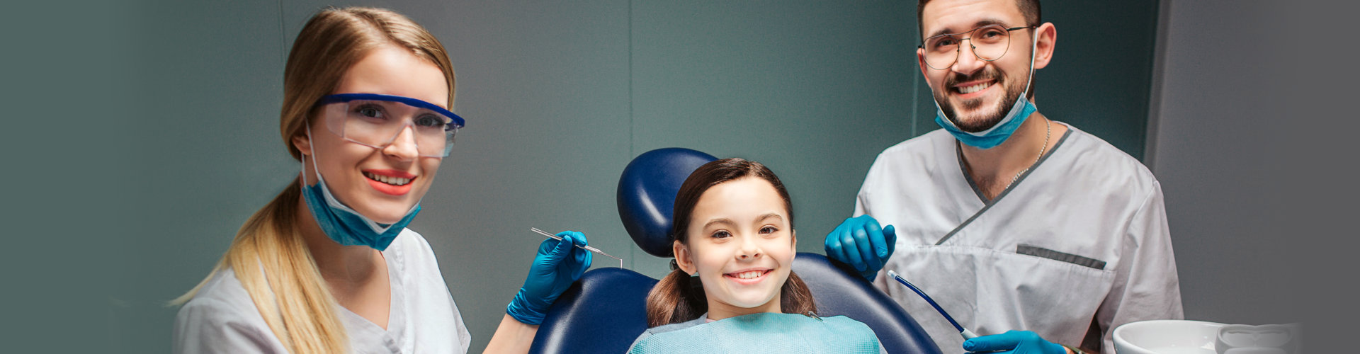 cheerful girl with two dentist